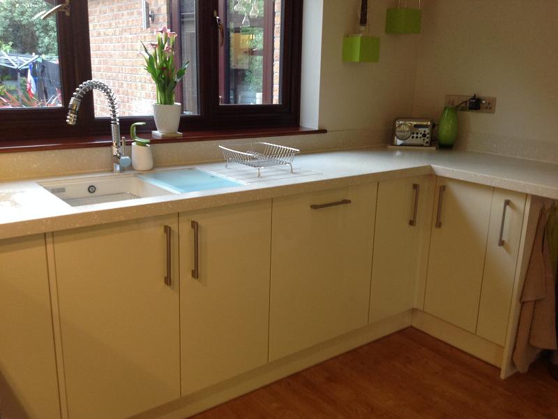 Logica Gloss Ivory kitchen fitted with Encore worktops