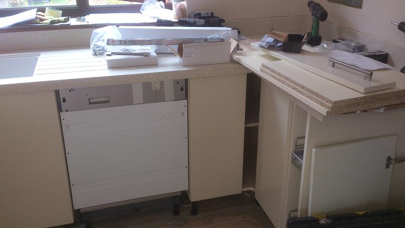 Logica Gloss Ivory kitchen fitted with Encore worktops