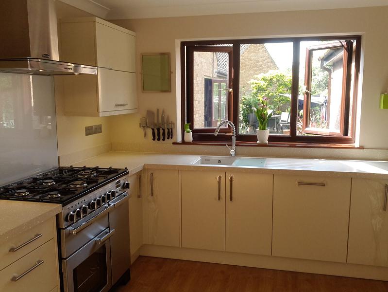 Logica Gloss Ivory kitchen fitted with Encore worktops