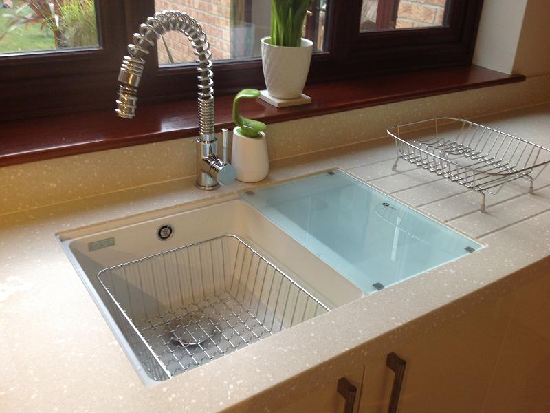 Logica Gloss Ivory kitchen fitted with Encore worktops