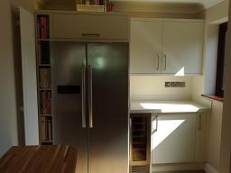 Logica Gloss Ivory Kitchen fitted with Encore Calico worktops