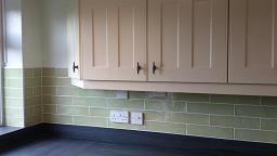 Optima T-bar Buttermilk kitchen fitted with laminate worktops in Lowestoft
