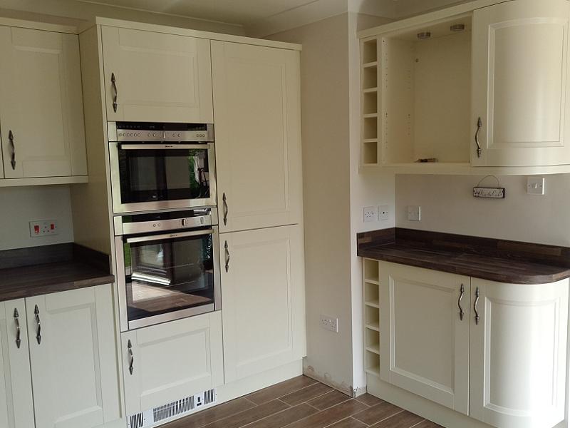 Richmond Ivory Painted kitchen fitted with laminate worktops