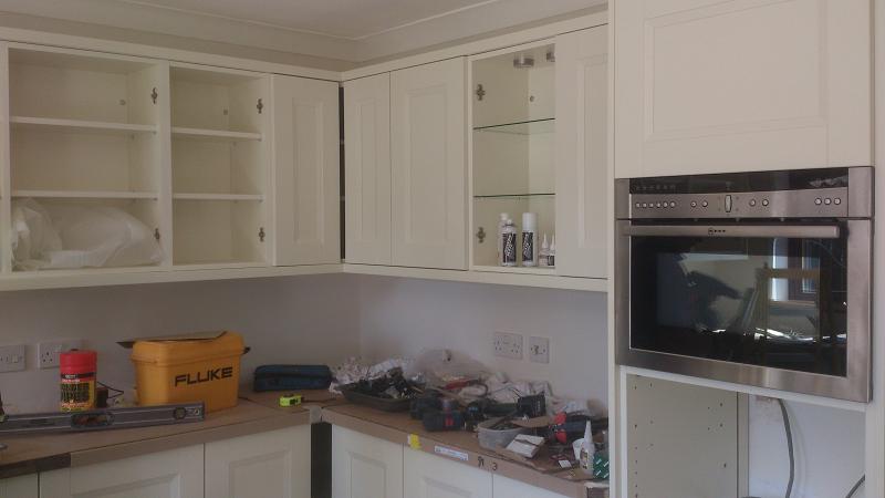 Richmond Ivory Painted kitchen fitted with laminate worktops