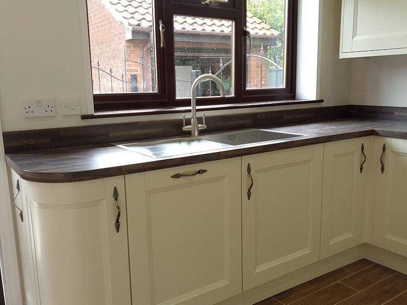 Richmond Ivory Painted kitchen fitted with laminate worktops