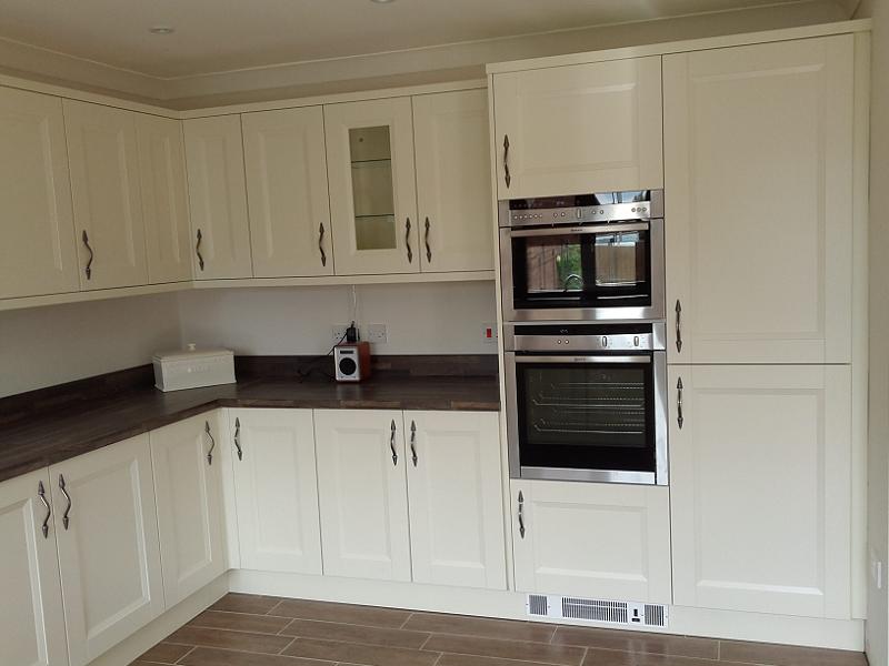 Richmond Ivory Painted kitchen fitted with laminate worktops