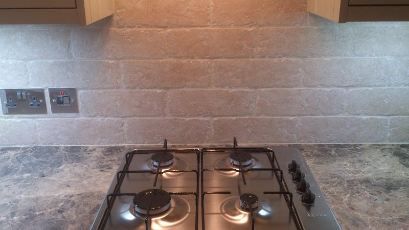 Shaker Wood Blue kitchen fitted with laminate worktops