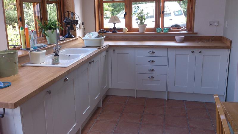 Shaker Wood white kitchen fitted with oak worktops