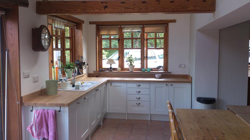 Shaker Wood white kitchen fitted with oak worktops