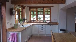 Shaker Wood White Kitchen fitted with oak worktops